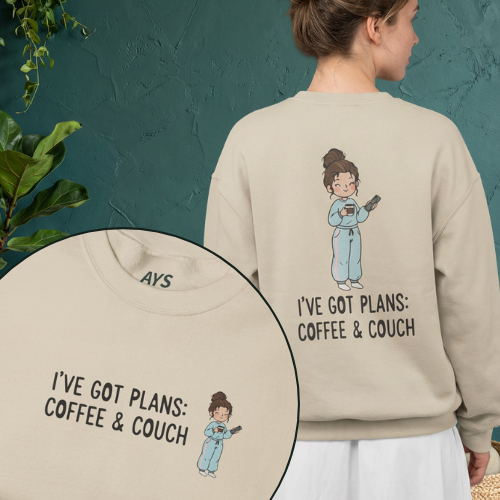 Crewneck Sweatshirt — "I've Got Plans: Coffee & Couch" Cozy Graphic Sweatshirt